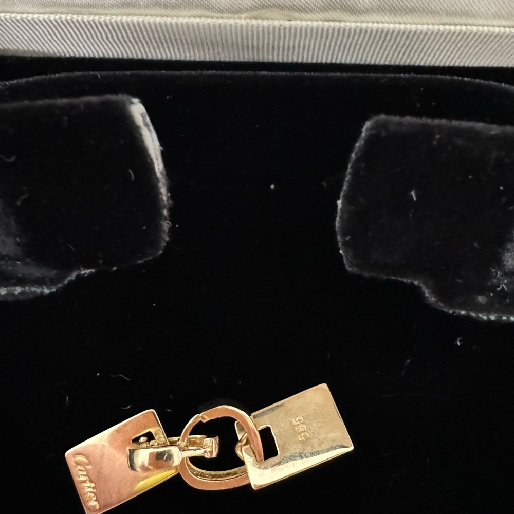 Cartier earrings 14 k gold 3 gram .